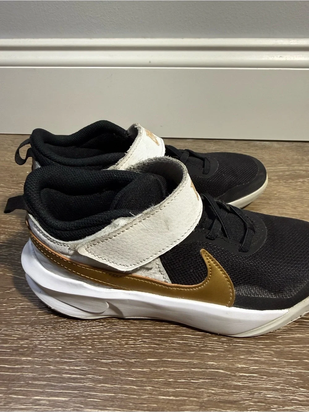 Nike Kids Black, White and Gold Velcro Strap Sneakers